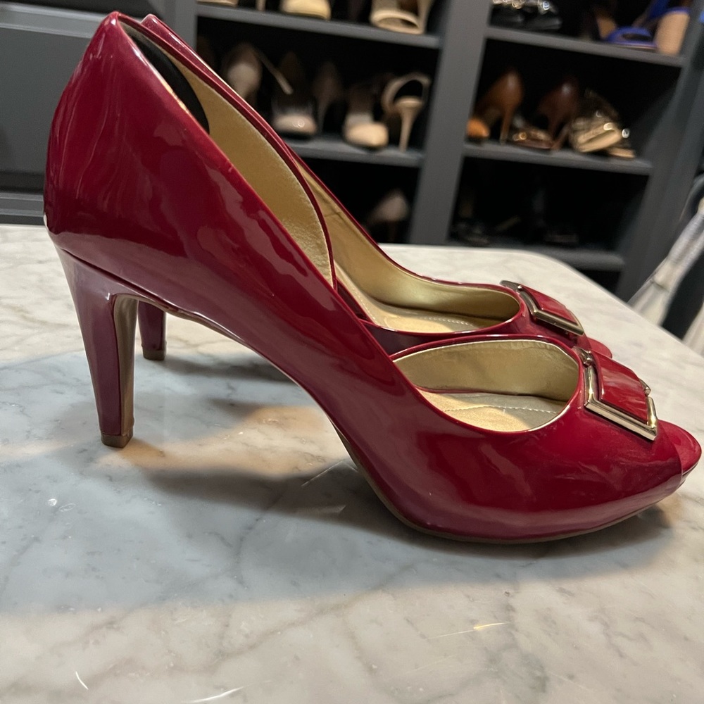 Red patent leather heels. Very limited wear. Size 11